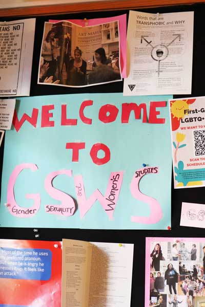 a bulletin board full of flyers and a poster saying welcome to g.s.w.s.